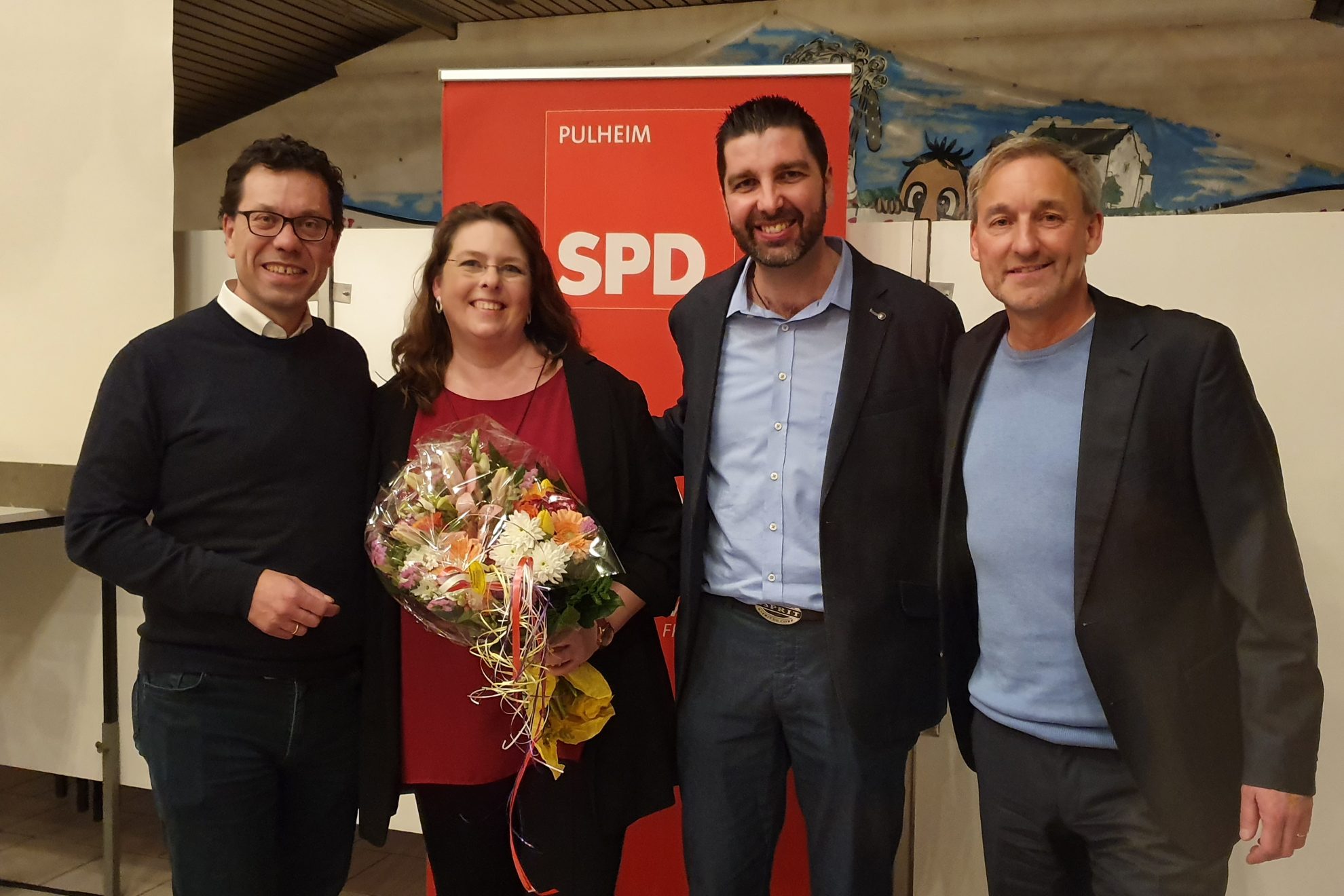 Dierk Timm, Markus Knabel und Frank Sommer gratulieren Marion Reiter